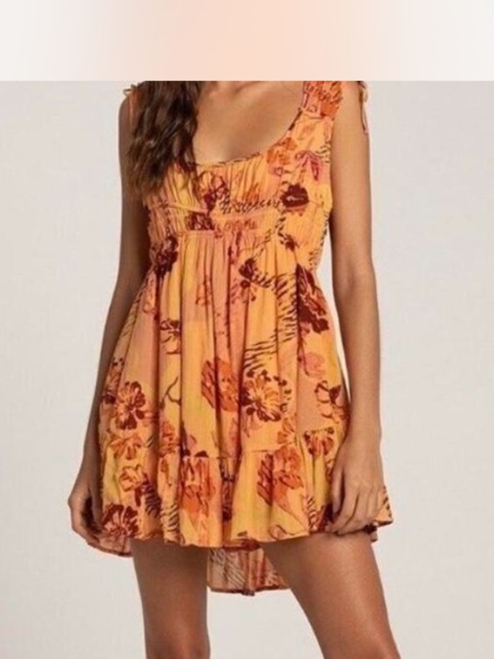Free People Vernon Mini Dress features tie-shoulder straps and a smocked bodice